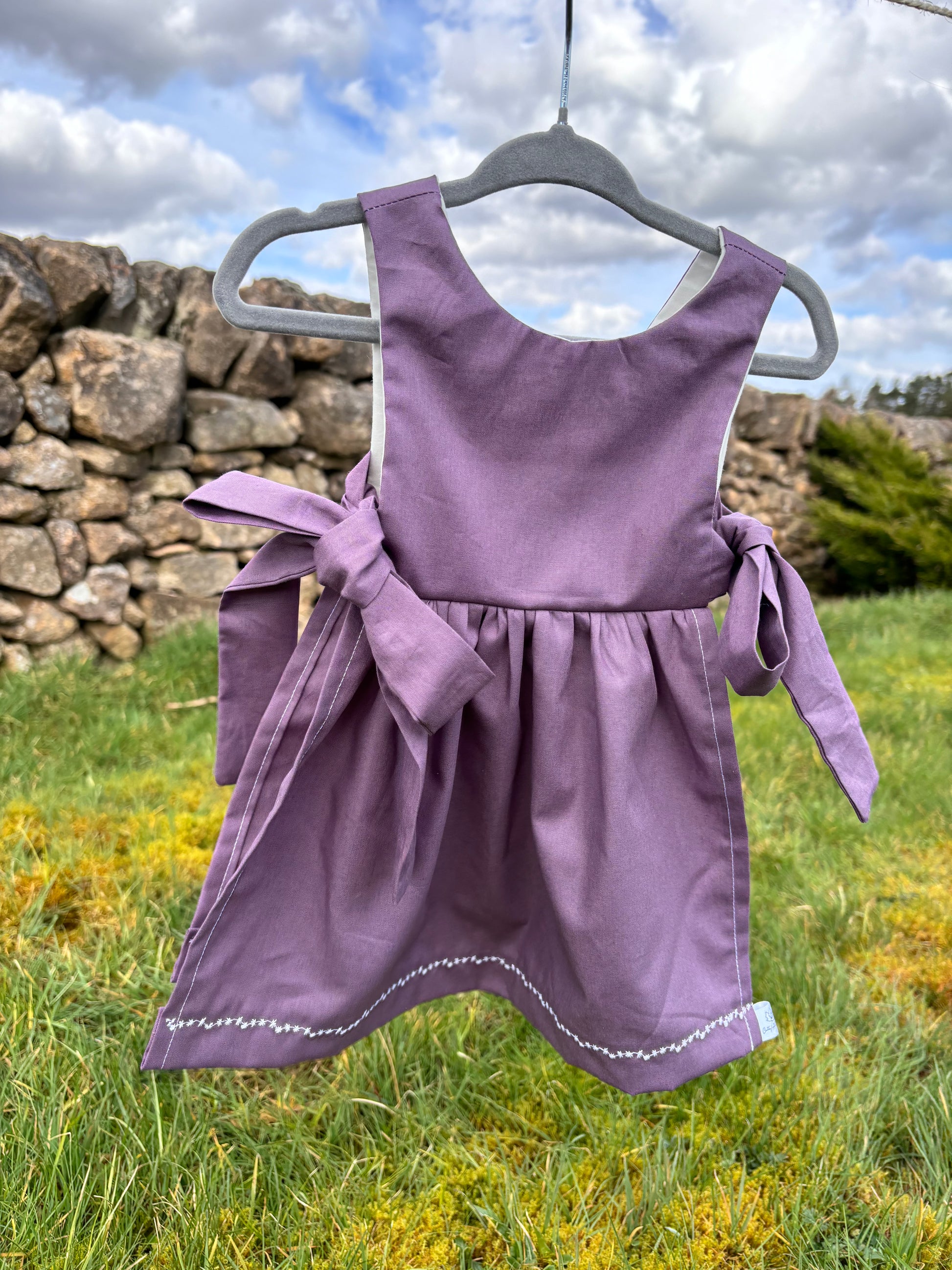 Organic cotton baby pinafore purple