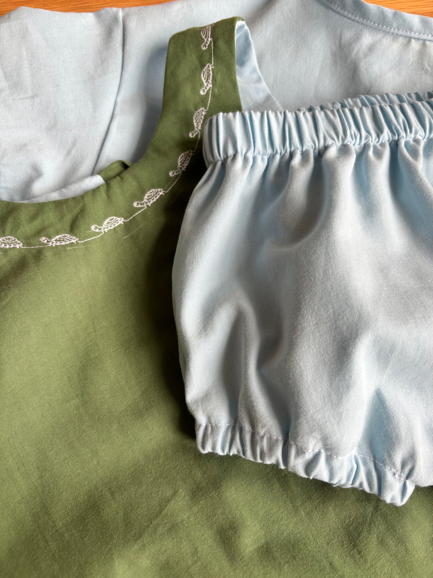 Organic cotton baby romper green