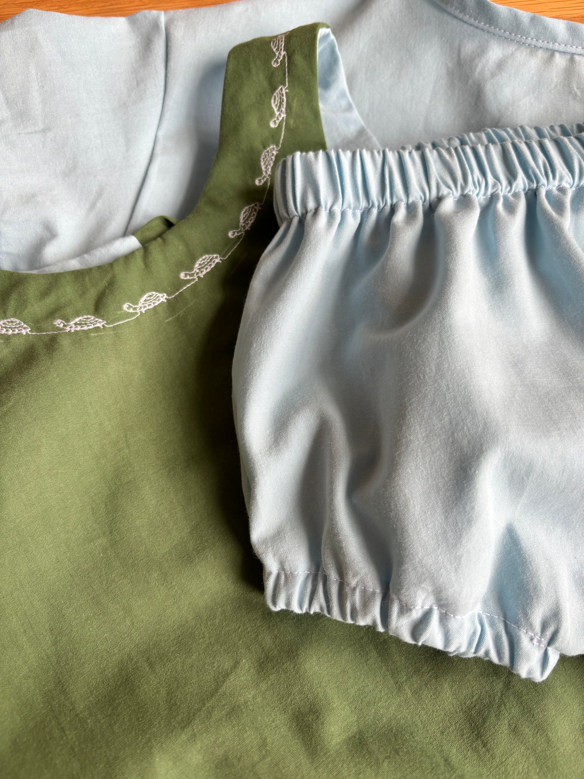 Organic cotton baby romper green