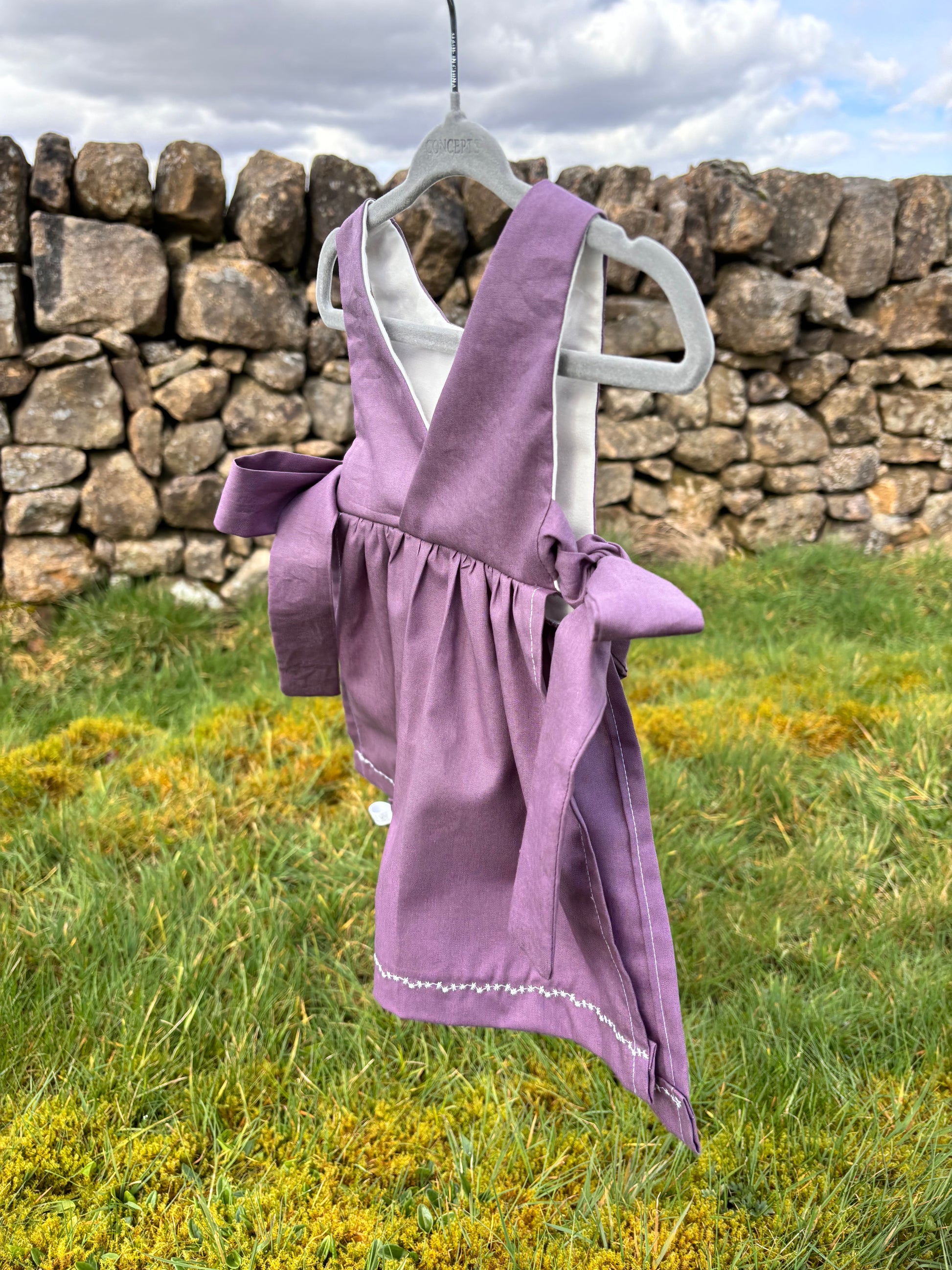 Organic cotton baby pinafore purple