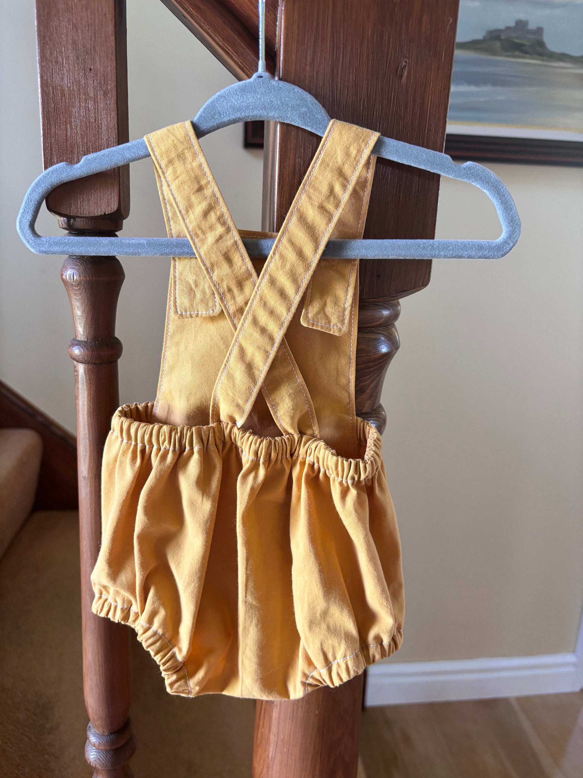 Yellow organic cotton baby romper