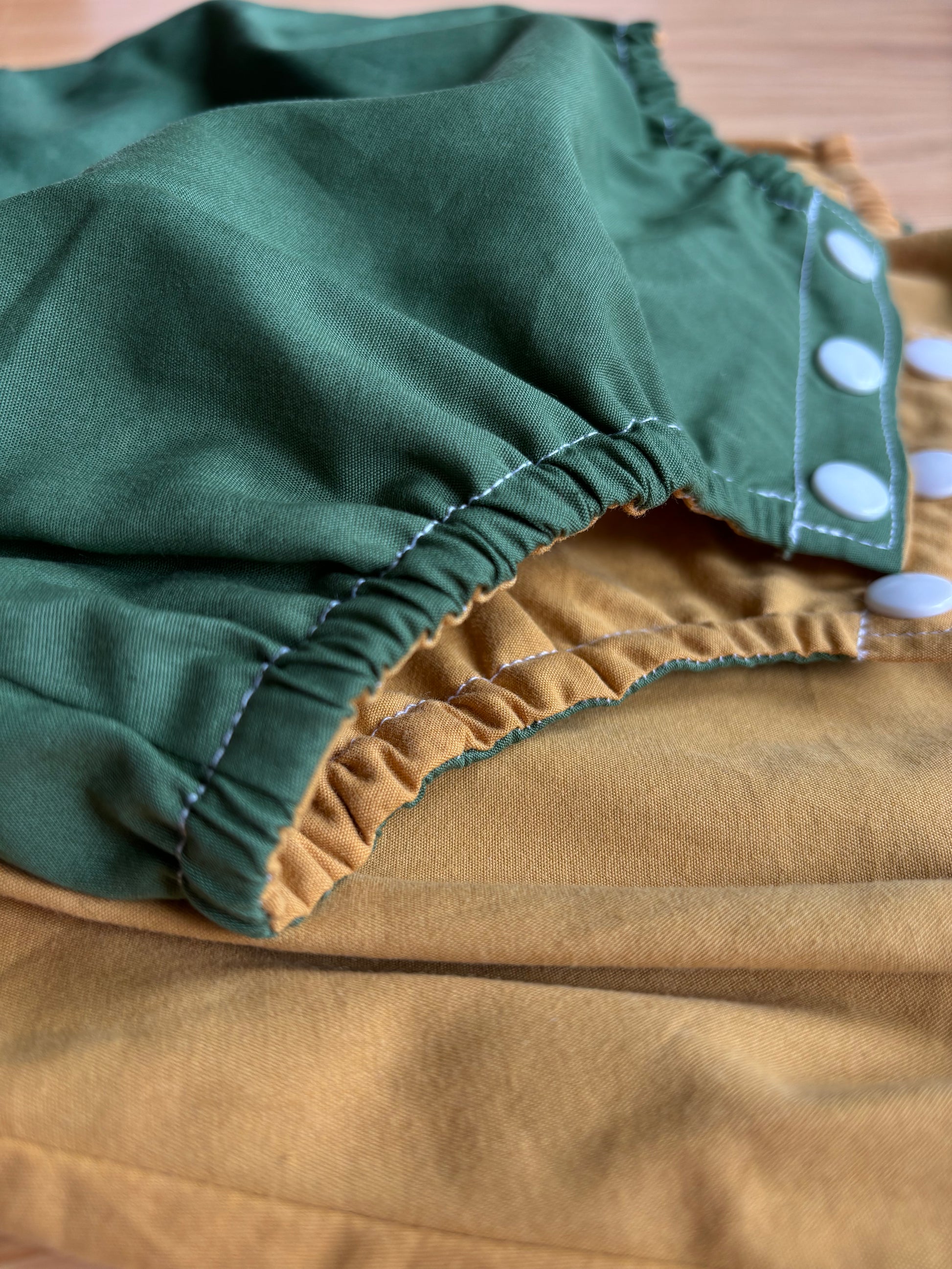 Organic cotton baby romper green