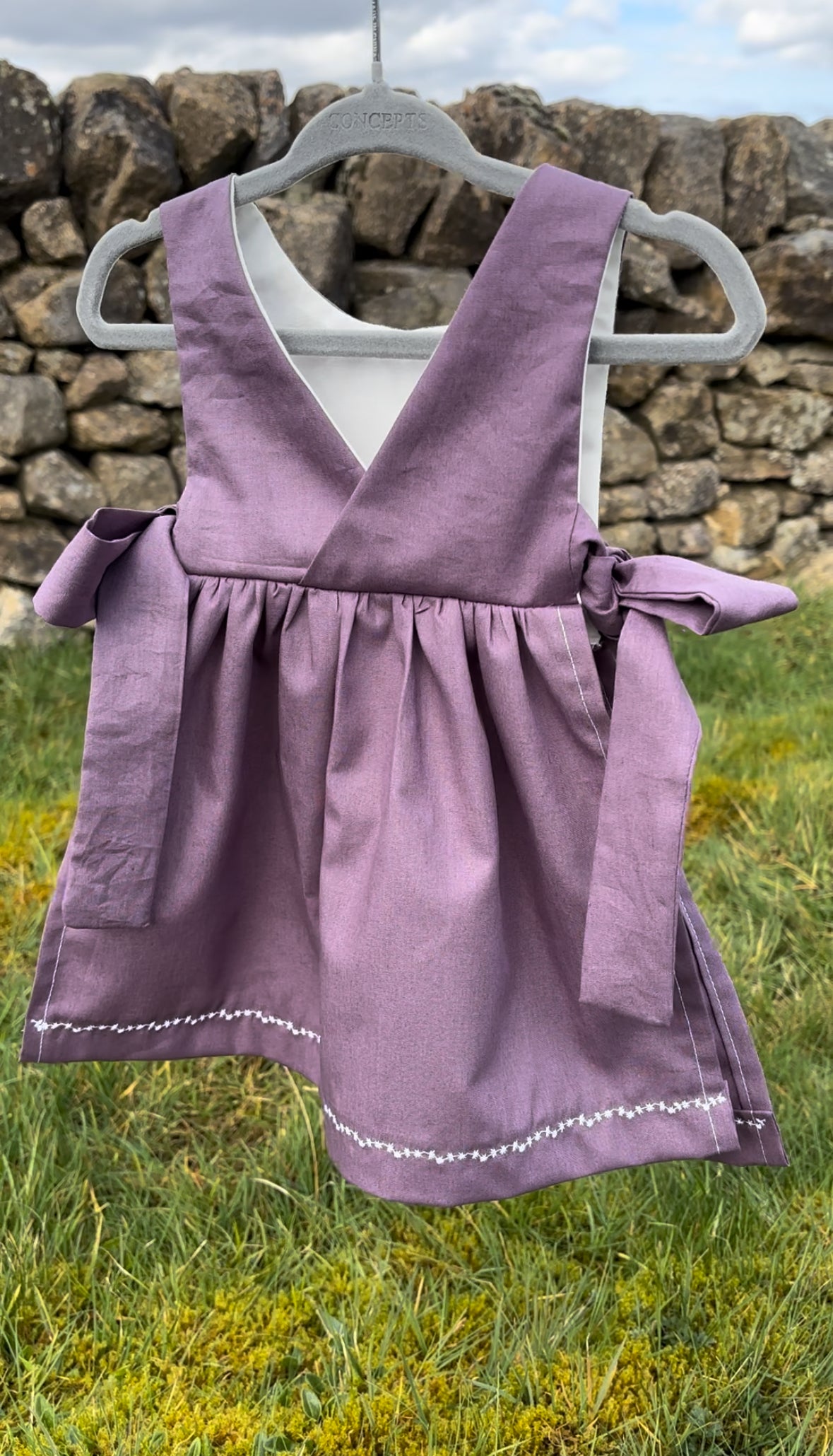Organic cotton baby pinafore purple