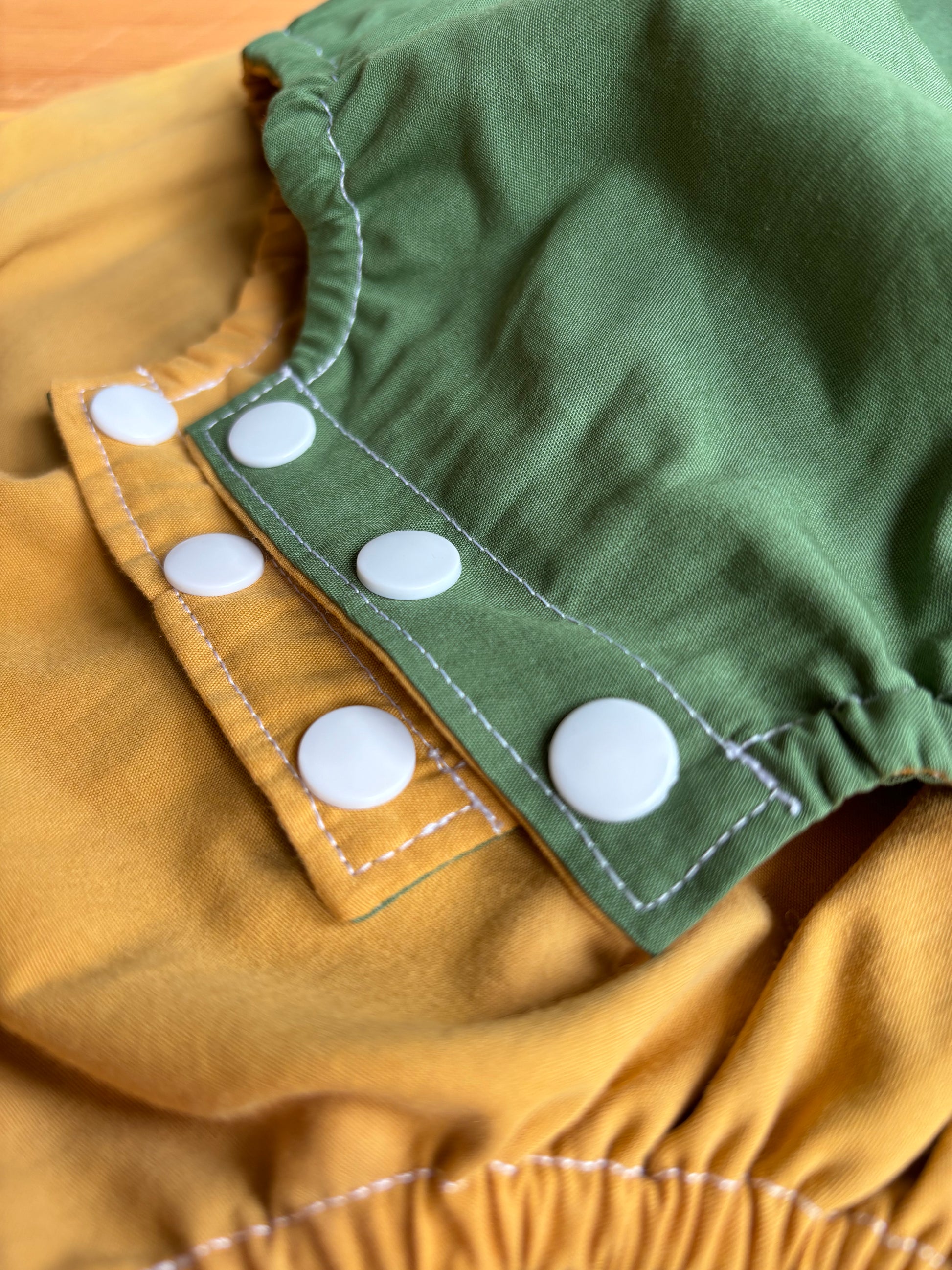 Organic cotton baby romper green